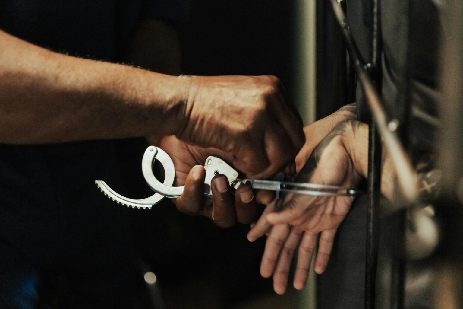 handcuffs being taken off