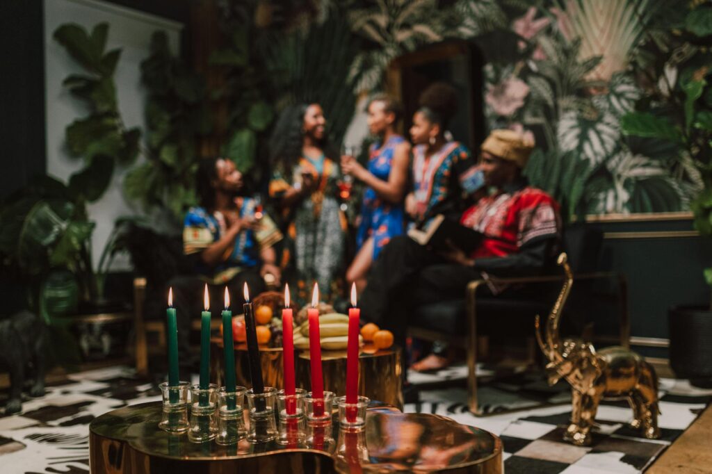 people sitting on chair in front of table with candles