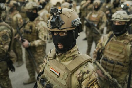 soldiers in tactical gear preparing for mission