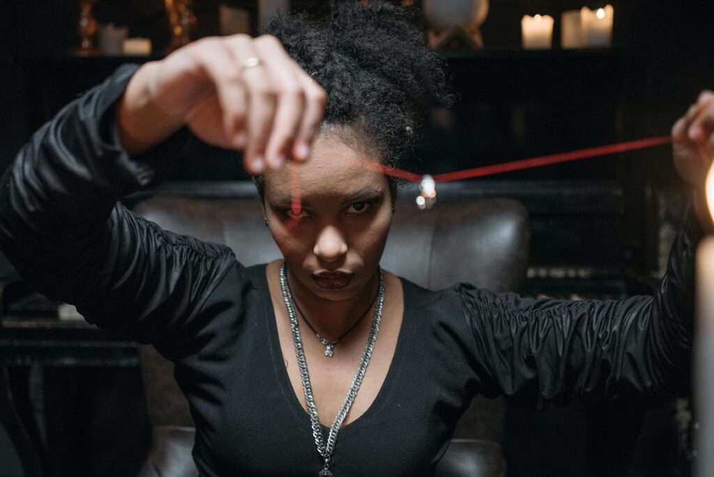 a woman holding a necklace